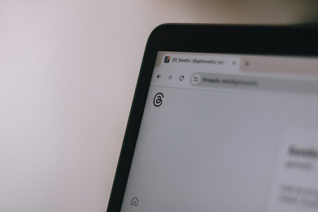 A close up of a computer screen with a blurry background