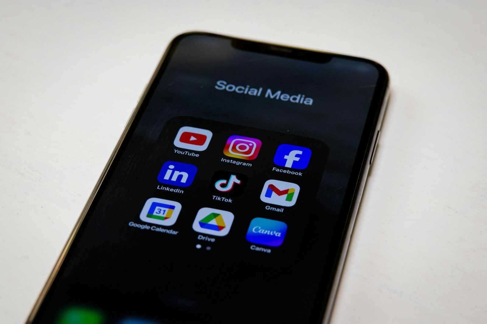 Social media apps are displayed on a smartphone