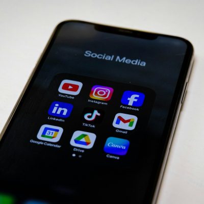 Social media apps are displayed on a smartphone