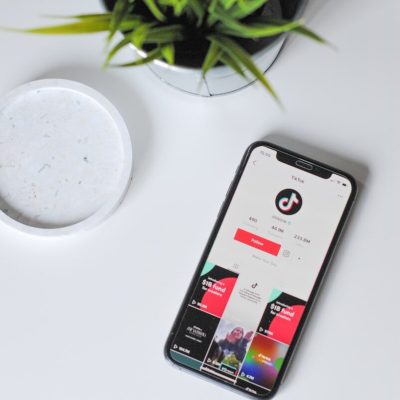 iphone xs on white table
